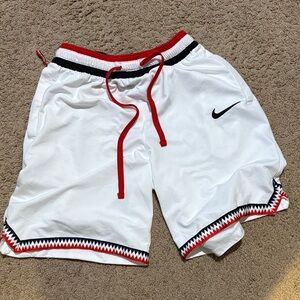 Nike Men’s White Athletic Shorts with Red and Black Accents